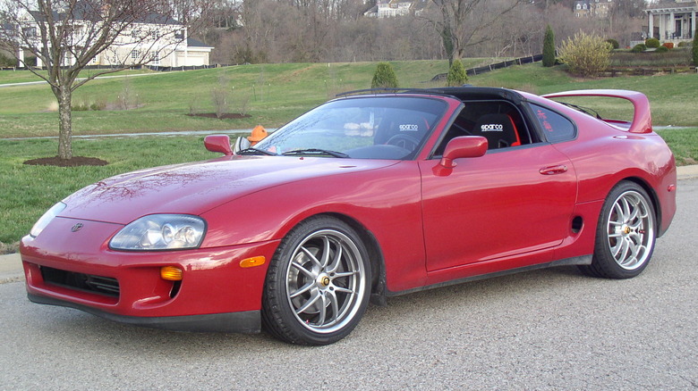 A red 1994 Toyota Supra twin turbo parked off of River Road in Louisville, Kentucky.