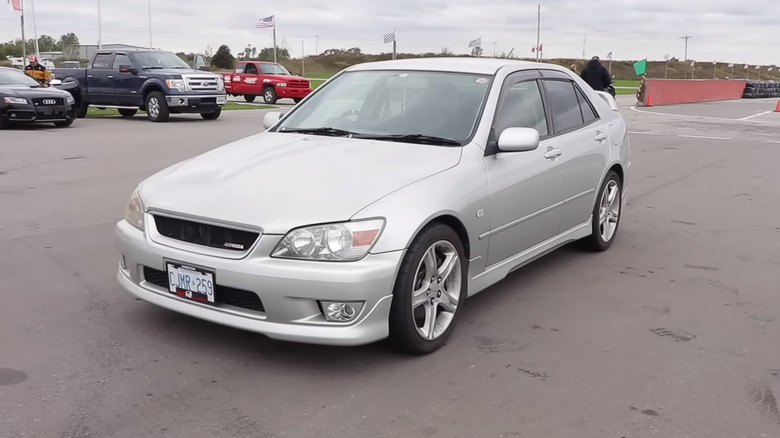 White Toyota Altezza on a parking lot