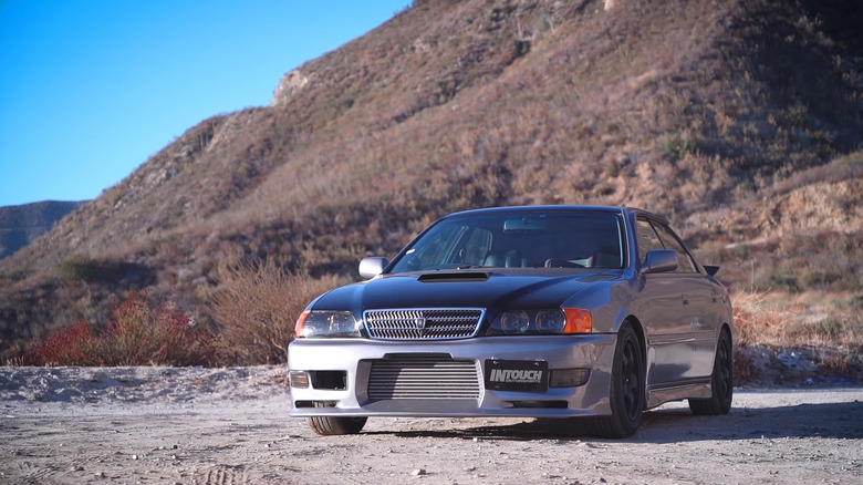 Grey Toyota Chaser with tuning modifications