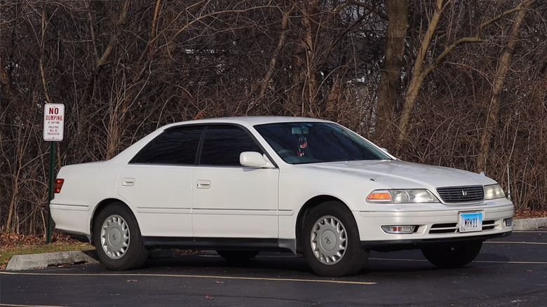 White Toyota Mark II on a parking lot