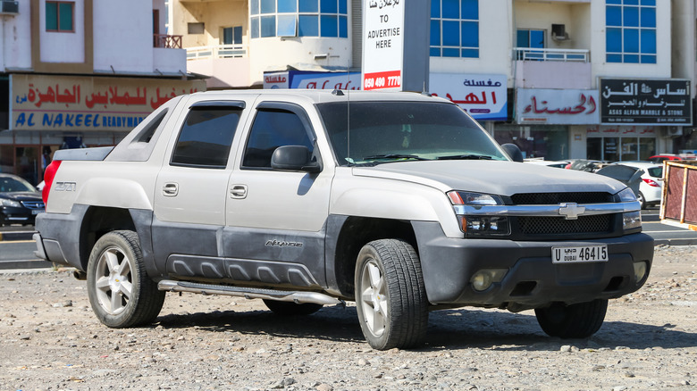 gray Chevrolet Avalanche truck street