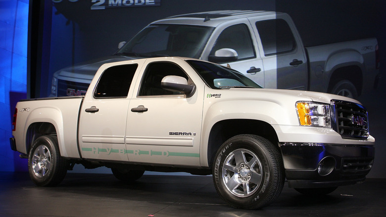 tan gmc sierra hybrid prickup truck reveal