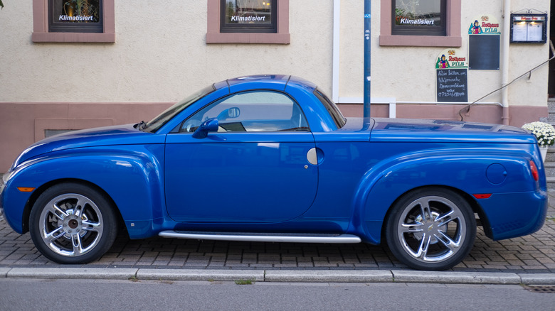 blue Chevrolet SSR pickup truck parked street