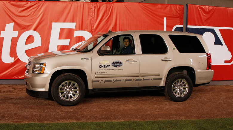 tan Chevrolet Tahoe Hybrid suv truck baseball giveaway