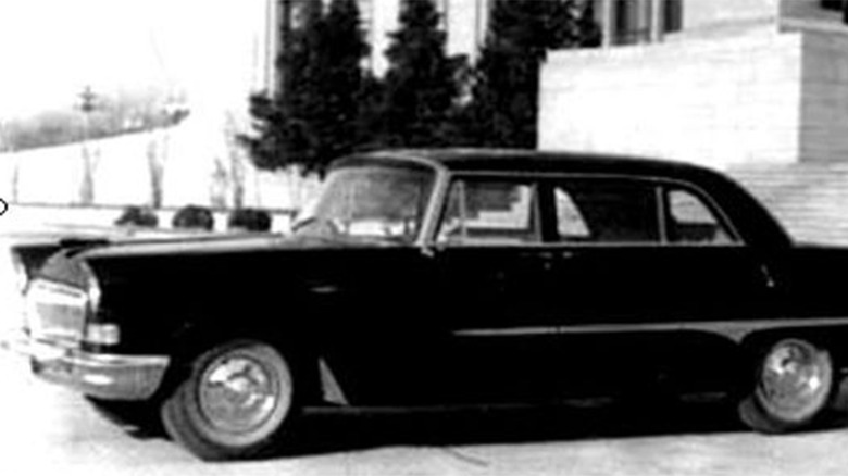 A black Hongqi CA72 on a city street in 1959