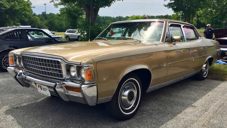 Tan 1972 AMC Ambassador parked on asphalt