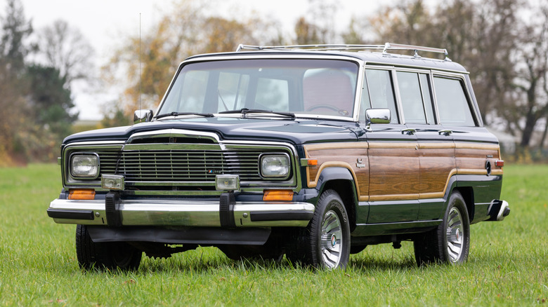 Jeep Grand Wagoneer parked on grass