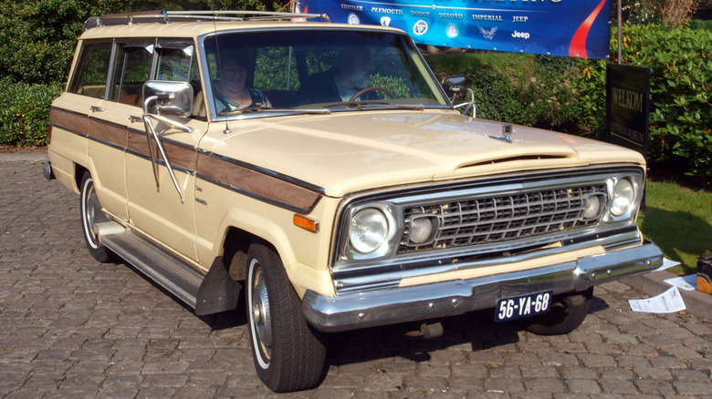 1976 Jeep Wagoneer parked on cobblestones