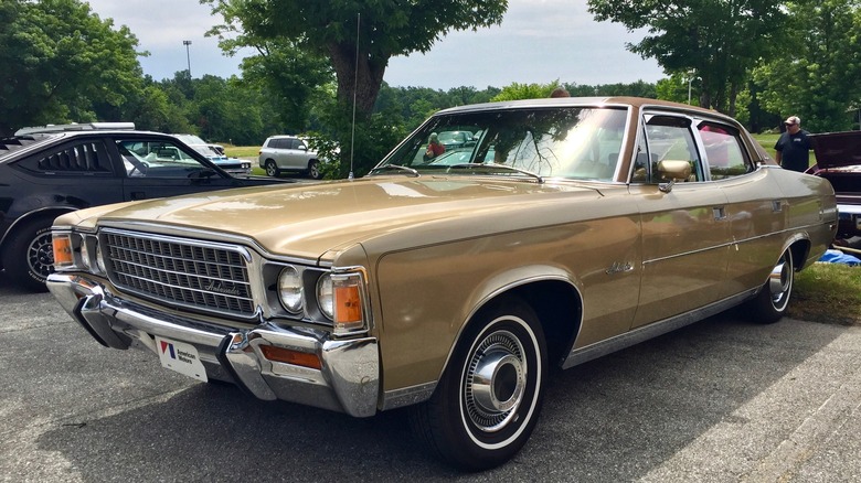 Tan 1972 AMC Ambassador parked on tarmac