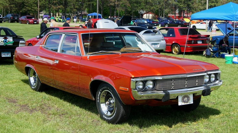 Red 1973 AMC Matador parked on grass