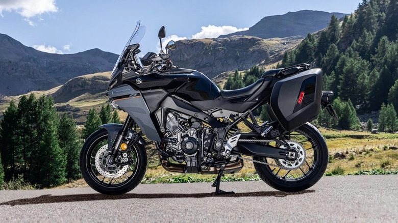 Gray 2025 Yamaha Tracer 9 parked on asphalt in mountains