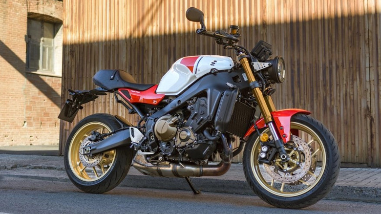 Red and white 2025 Yamaha XSR900 parked on the street