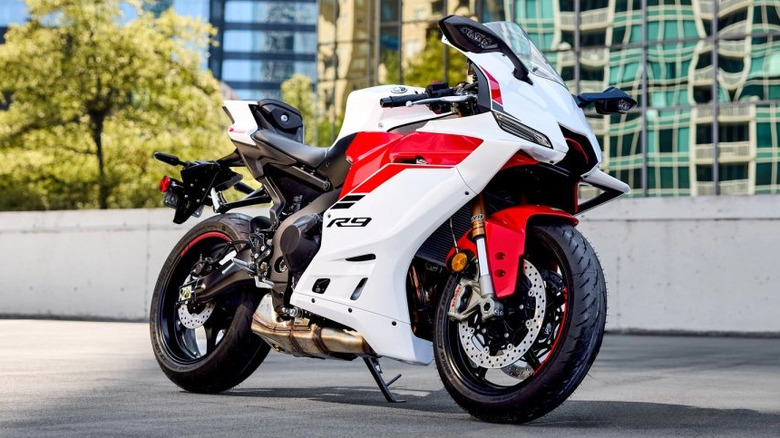 Red and white Yamaha YZF-R9 parked in the city