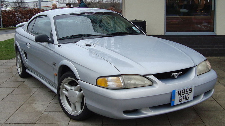 Silver 1995 Mustang Parked