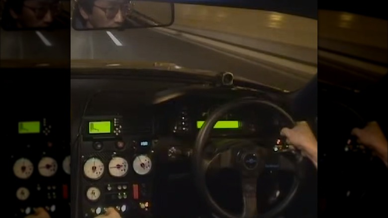 Smokey Nagata driving a Nissan R33 Skyline GT-R in Tokyo Bay's Aqua-Line tunnel