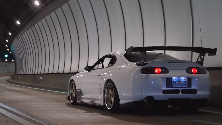 White Smokey Nagata Toyota Supra with RB26 engine back 3/4