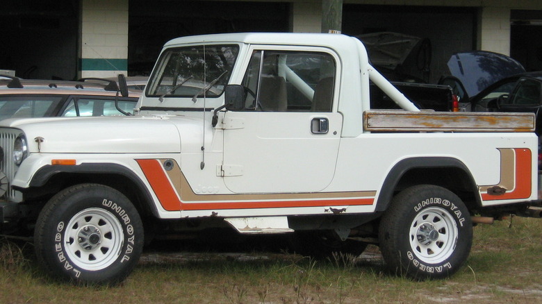 White Jeep CJ8 Scrambler parked