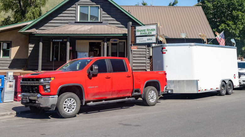 A Silverado Pickup Pulling a Trailer