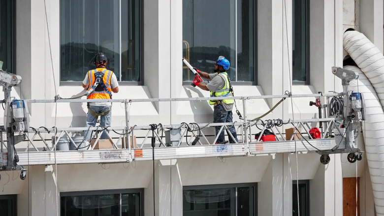 Workers with Milwaukee BOLT helmets