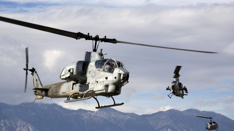 AH-1 Cobra helicopters flying