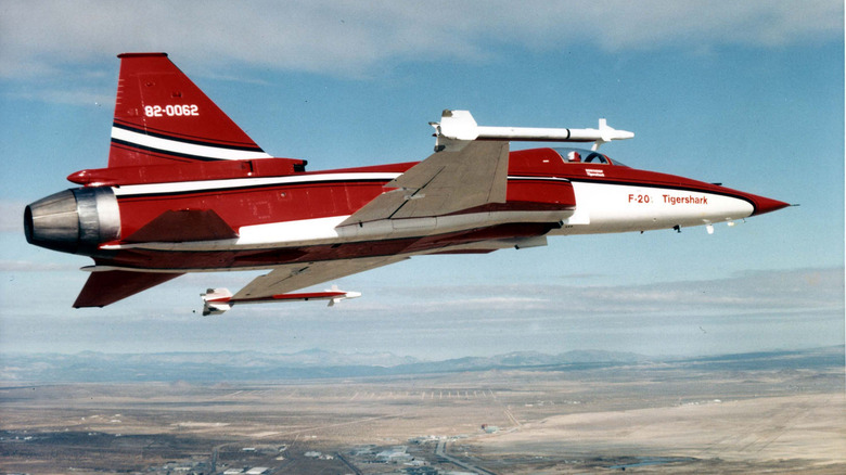 Red Northrop F-20 Tigershark in flight