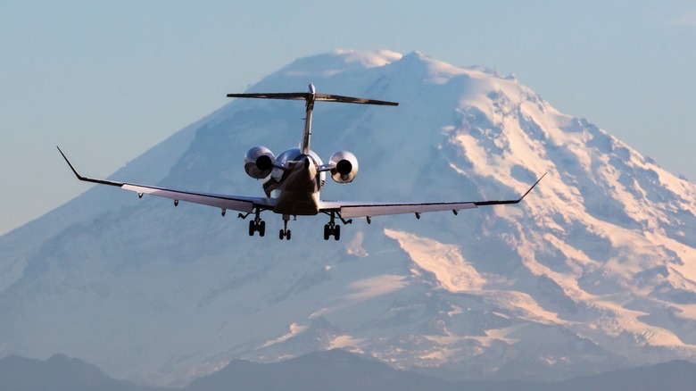 Gulfstream G700 landing in front of mountain