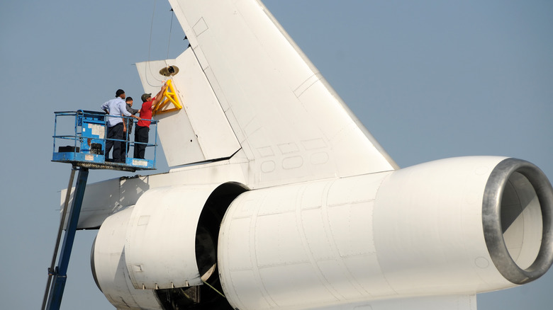 performing maintenance on DC-10