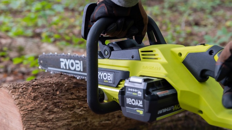 Ryobi 40V chainsaw cutting log