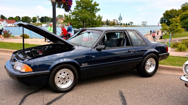 A 1993 Ford Mustang with the engine bay open