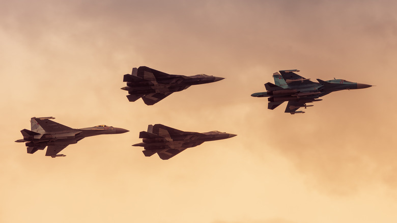 Four Russian fighter jets flying