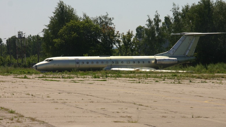 abandoned Tu-134 in grass