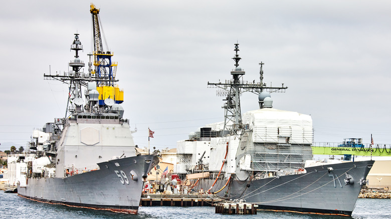 The USS Cape St. George and USS Princeton docked beside one another.