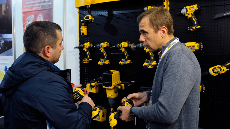 Two people talking about DeWalt tools