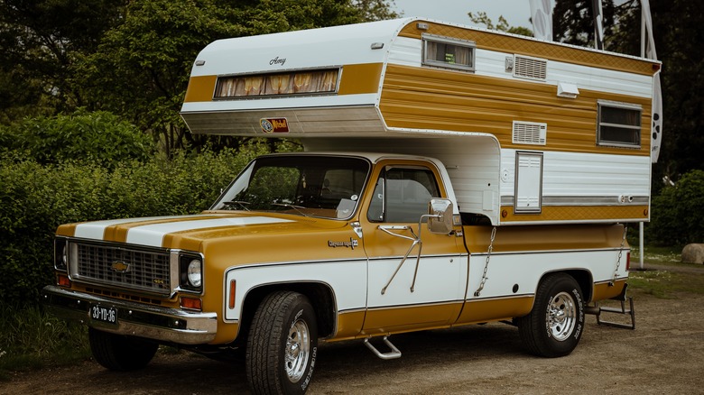 old truck with truck camper