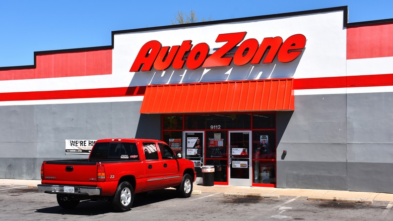 red truck parked outide AutoZone