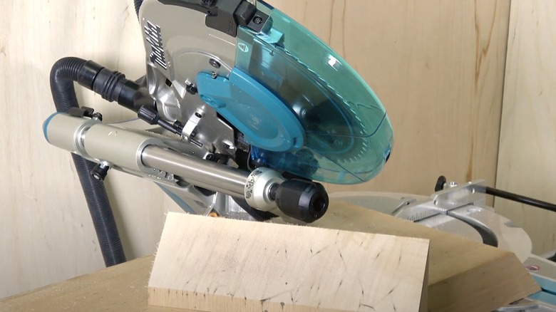 Makita miter saw at work