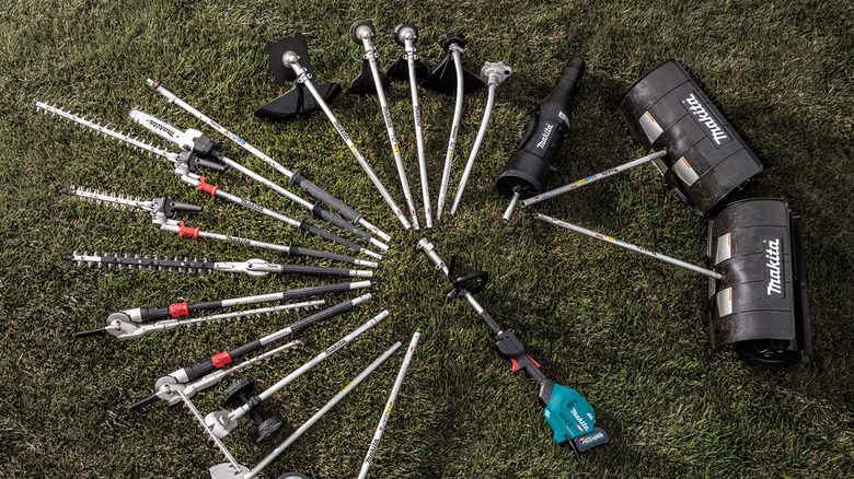 Makita outdoor tools displayed on the grass