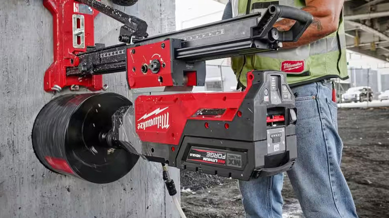 Milwaukee core drill drilling into concrete