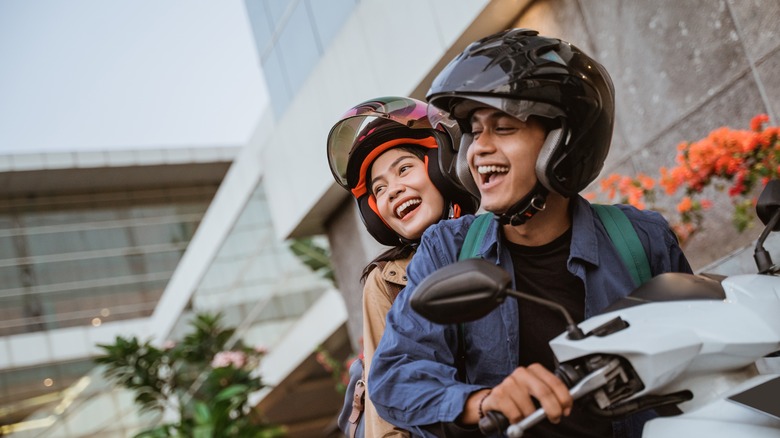 couple riding a motorcycle