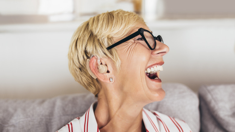 woman wearing hearing aid