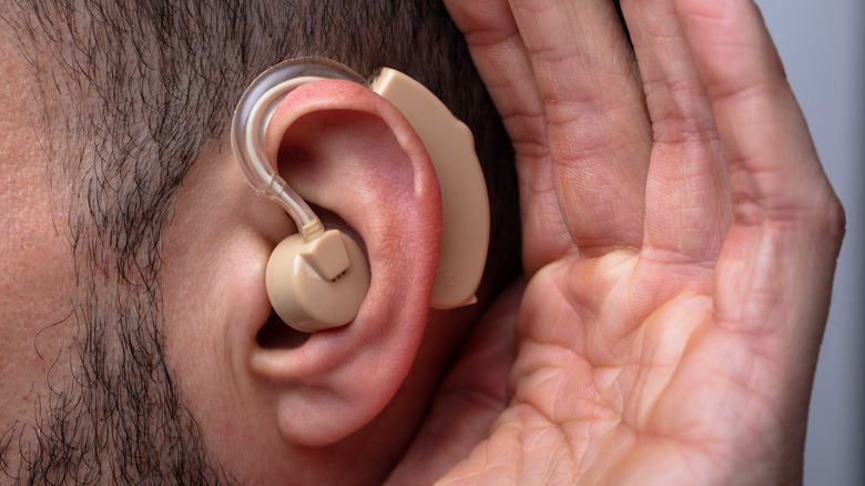 person with hearing aids