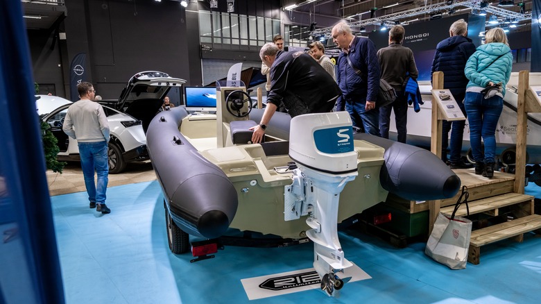 electric boat on trade show room floor