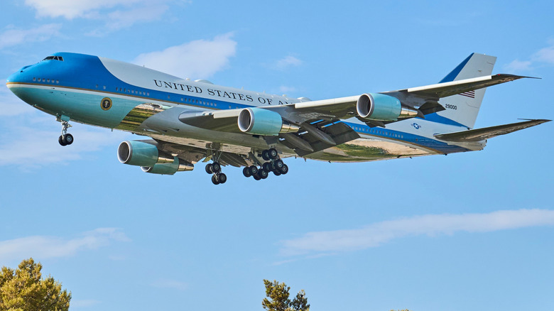 Air Force One landing at an airport.