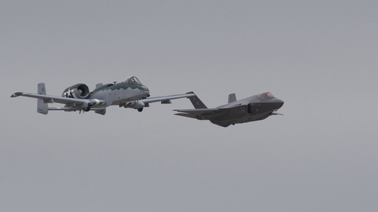 F-35 and A-10 flying together.