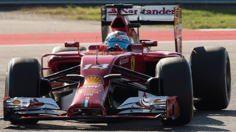 Fernando Alonso in No. 14 Ferrari on track at 2014 United States Grand Prix