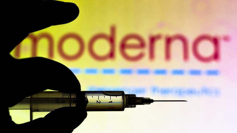 Syringe and Moderna logo