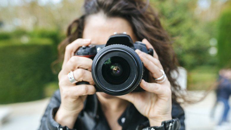 Woman using a digital camera