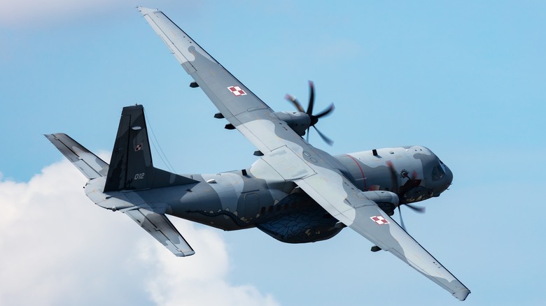 Airbus C295 flying over clouds