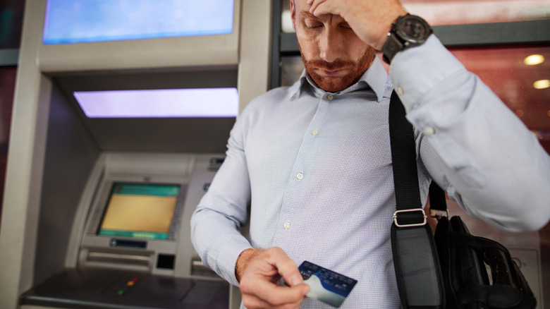 Person outside an ATM