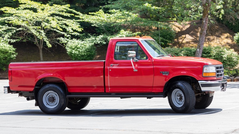 Red 1996 Ford Super Duty powered by a Power Stroke diesel